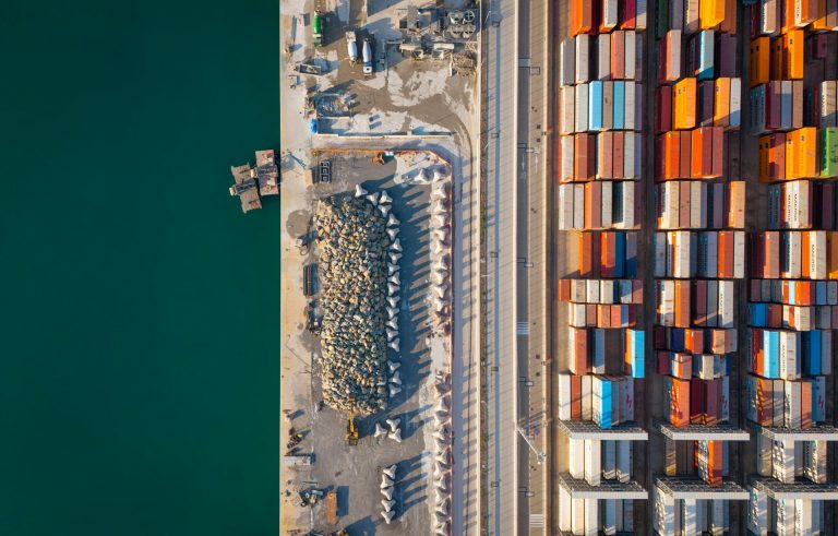 Shipping containers stacked at a port terminal